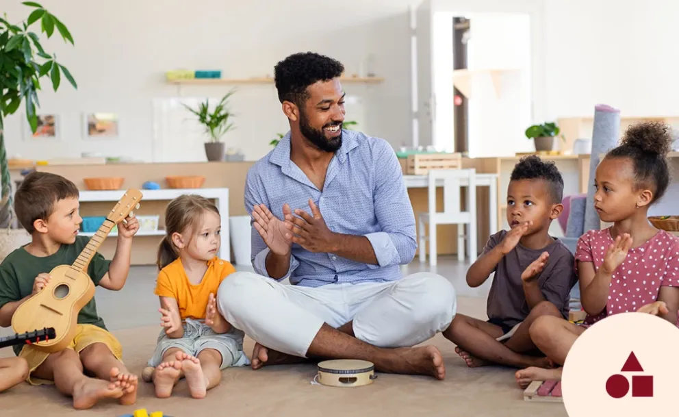 Mensch mit Kindern in Sitzkreis